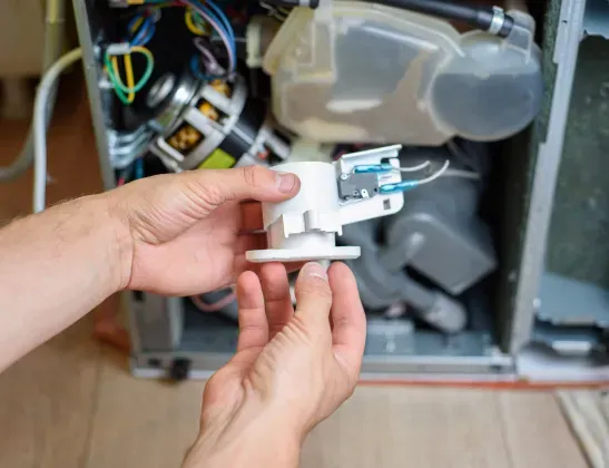 handyman-repairs-dishwasher-water-leakage-protection